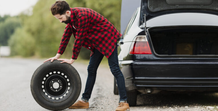 side-view-man-with-spare-tyre