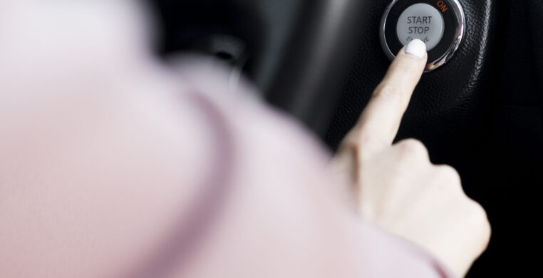 woman-pushing-start-button